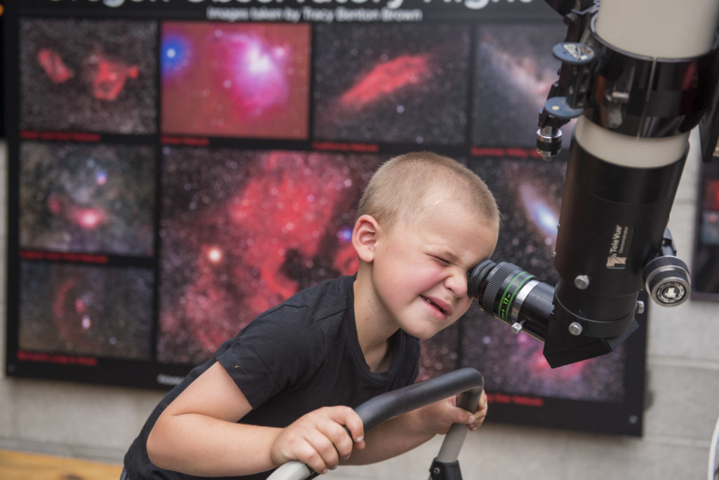 Child_Looking_Through_Telescope